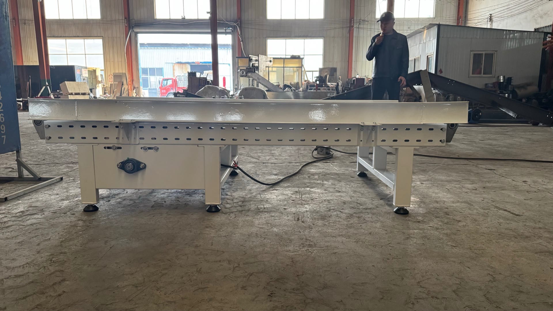PENKOR workshop — slat chain conveyors during assembly